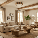 Striped raffia drum ceiling light under a beamed ceiling in a bright living room