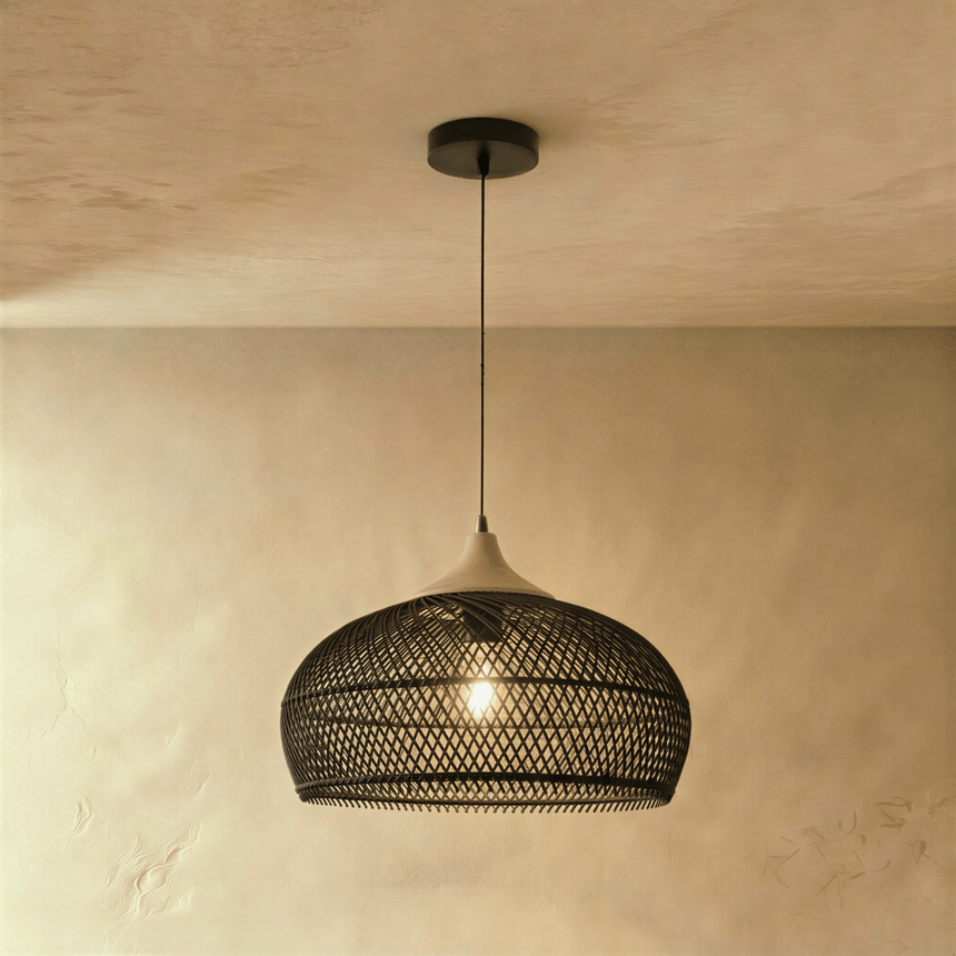 A low black dome shade, the weave tight at the top and open below