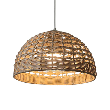 Rattan dome switched on, the weave glowing from within