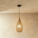 A tall narrow natural shade shaped like a teardrop on a long cord