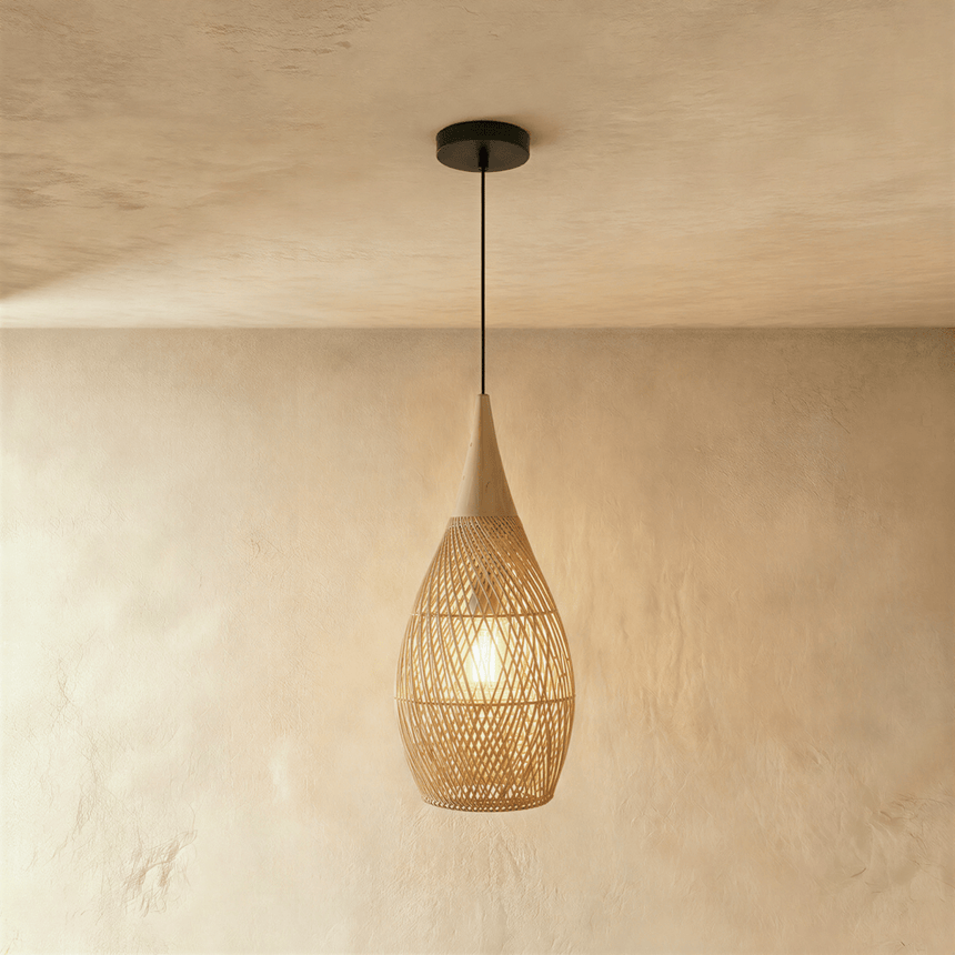 A tall narrow natural shade shaped like a teardrop on a long cord