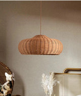 Low woven dome hung in a room with a wall mirror