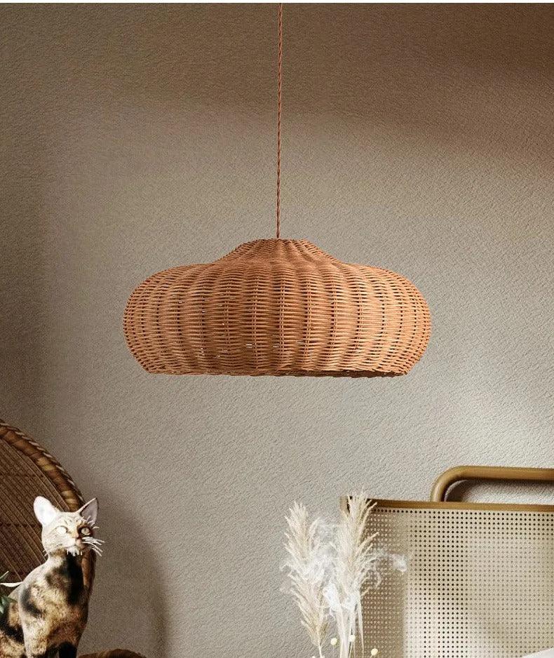 Low woven dome hung in a room with a wall mirror