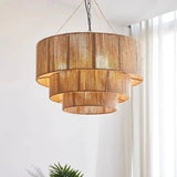 Close view of the three fringed tiers of the rattan drum pendant light