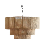 Rattan drum pendant light unlit against a gray background