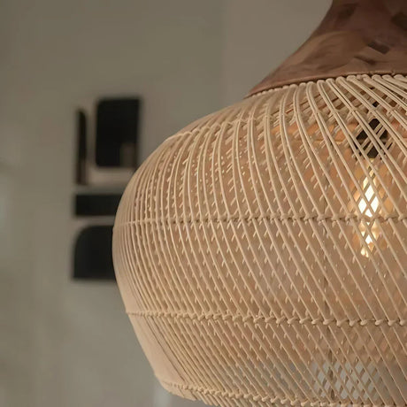 Close view of the bell weave with the light glowing through it