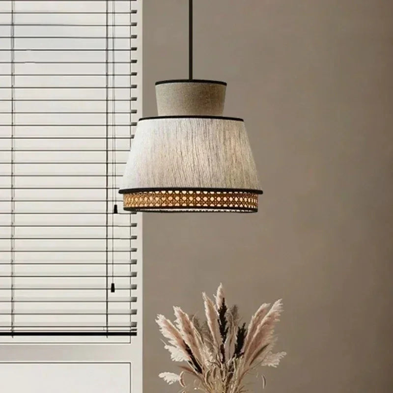 Close view of the hollow-out rattan weave above the fabric band