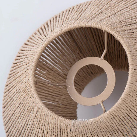 Looking up into the pleated rattan shade at the fitting inside