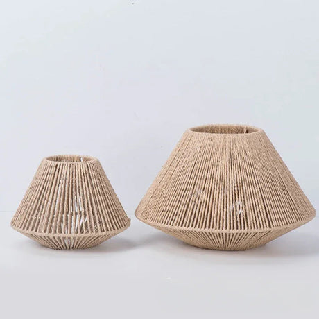 Pleated rattan shade on a plain background showing the flared profile