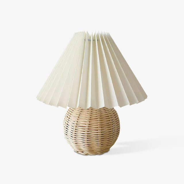 Rattan table lamp with a woven globe base and pleated shade, plain ground