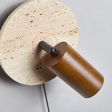 Close view of the joint where the head pivots against the stone disc