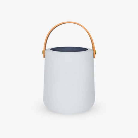 Small white cylinder lamp with a leather carry strap and a solar top
