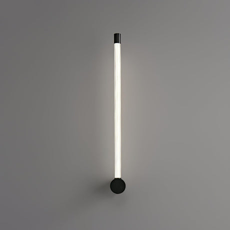 The black version mounted vertically, the tube lit from foot to tip