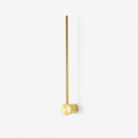 A slim copper rod with a weighted puck at its foot, the fitting switched off