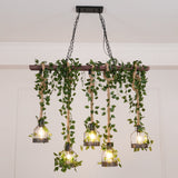 The eight lamp version lit beside a doorway, cages and foliage at staggered drops