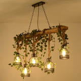 The five cage version lit under a warm ceiling, foliage trailing from the timber beam