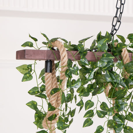 The hemp rope wrapped over the weathered beam with foliage tucked around it