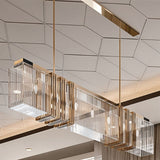 The bar lit below a patterned ceiling, the gold frame running the length of the room