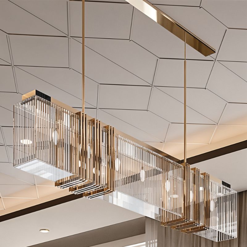 The bar lit below a patterned ceiling, the gold frame running the length of the room