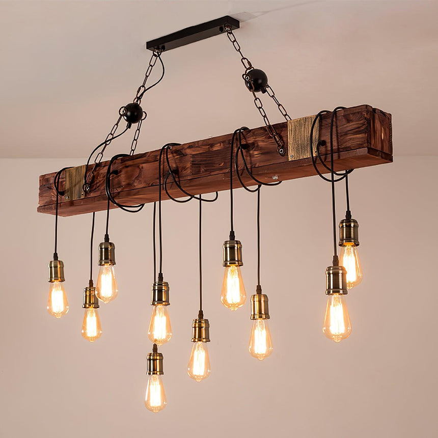 The beam lit against a warm pale wall, lamps hung at three different heights
