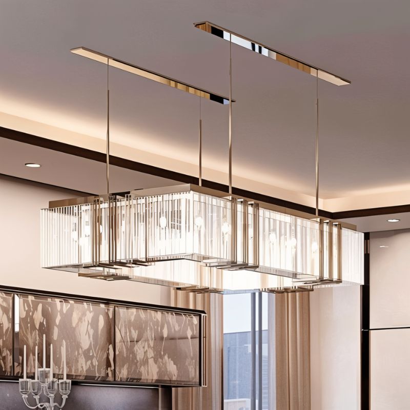 Two of the long bars hung in parallel above a counter in a pale open room