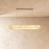 A lit bar with warm veining running the whole length of the face