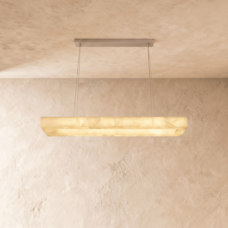 A lit bar with warm veining running the whole length of the face