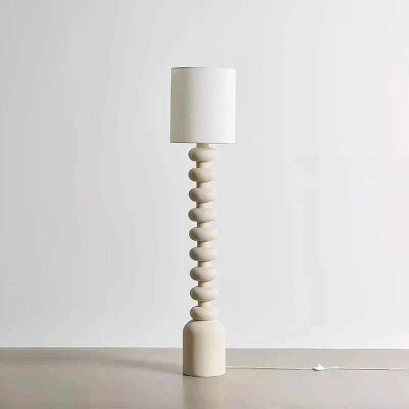Resin and fabric pendant lamp with warm white LED glow