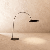 The same curved arm carrying a black ring, the light sitting inside the rim