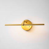The gold version lit, the tube bright and the disc plate catching the glow