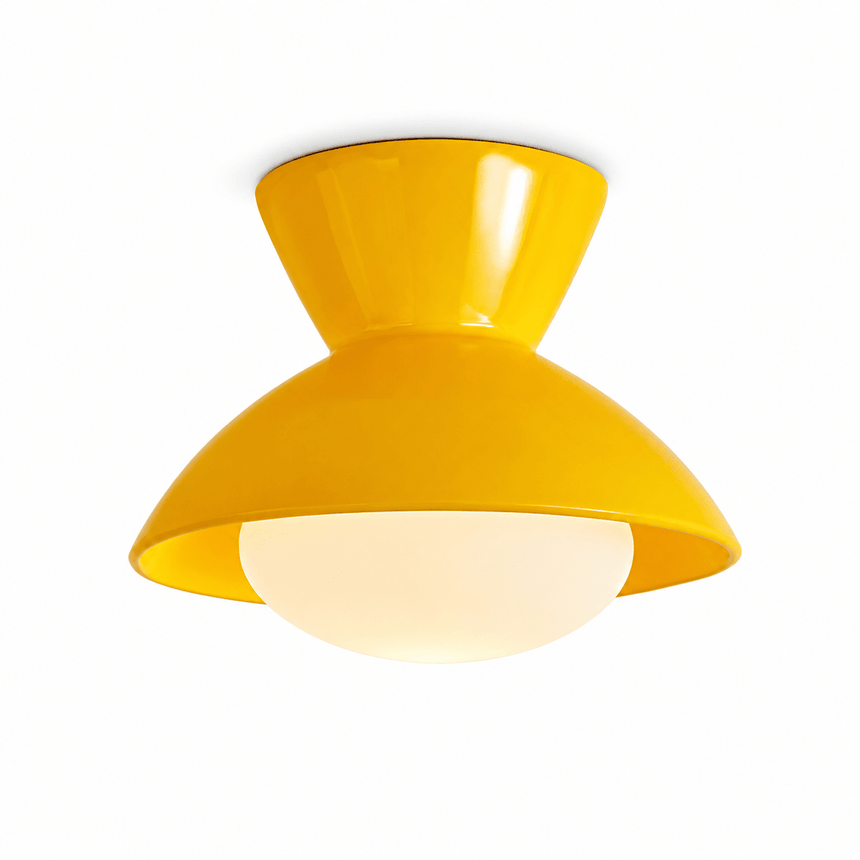 Yellow gourd ceiling light shown at an angle on a plain backdrop
