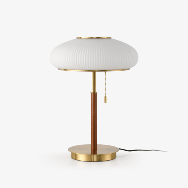 Ribbed glass table lamp with a brass foot and a walnut stem, plain ground