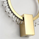 Close view of the crystal points along the gold ring and the backplate