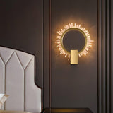 The ring lit beside a white upholstered headboard