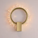 The ring lit warm, each crystal point glowing at its tip