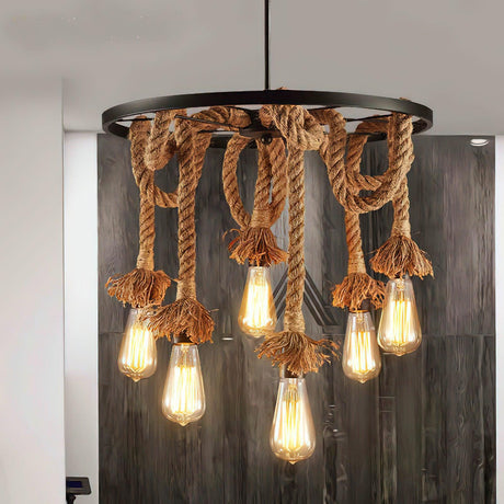 Chandelier lit against a wall of weathered timber boards beside a door