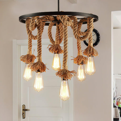 Chandelier lit beside a panel door in a plain hallway corner