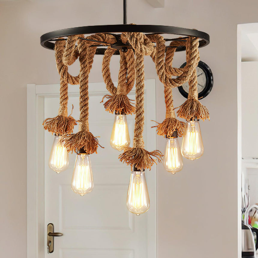 Chandelier lit beside a panel door in a plain hallway corner
