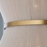 Close view of the brass band across the woven hemp rope