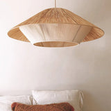 Hemp rope shade hung in front of a plaster wall