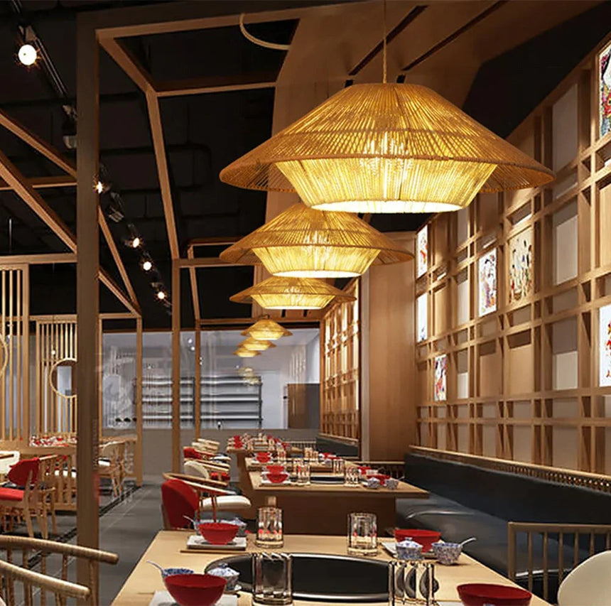 Hemp rope shades lit in a restaurant with timber beams