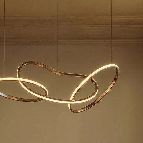 Two of the loops close up, the lit strip running along the inner edge of each