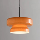 Amber tinted glass shade on a plain background