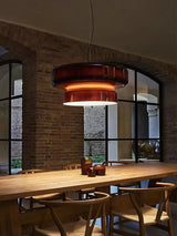 Tinted glass shades in a room with a brick wall