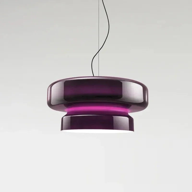 Purple tinted glass shade on a plain background
