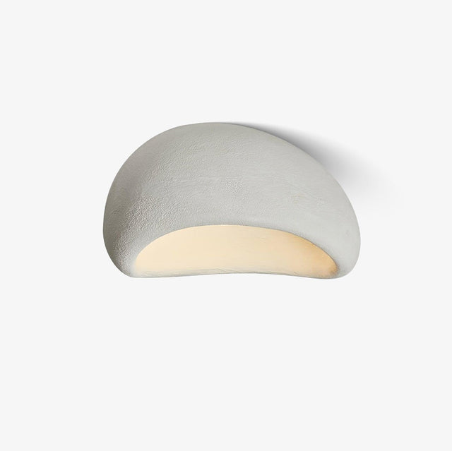 Round flush mount ceiling light with a textured white dome, shown on a plain background