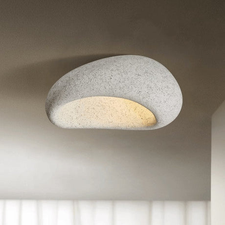 Light gray stone spot dome ceiling light against a plain background