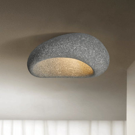 Dark gray stone spot dome ceiling light against a plain background