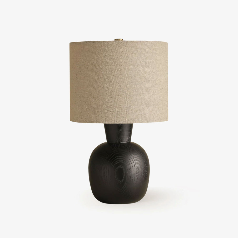 Table lamp with a black wood sphere base and a small beige linen drum