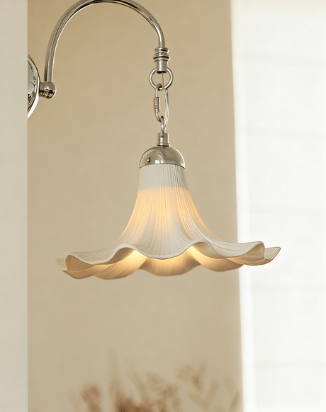 Close view of the chrome chain links and the ruffled rim lit